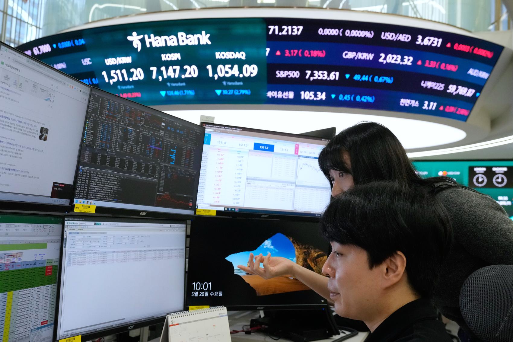Asian shares track Wall Street gains and oil prices climb on uncertainty over the Iran war