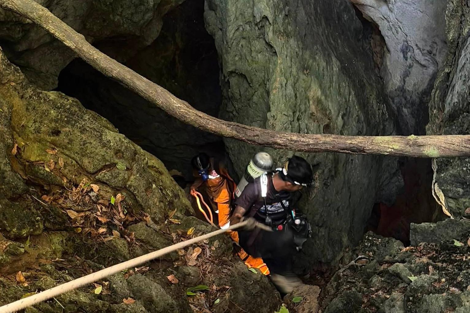 Heavy rains threaten to delay search for 2 people still missing in Laos cave