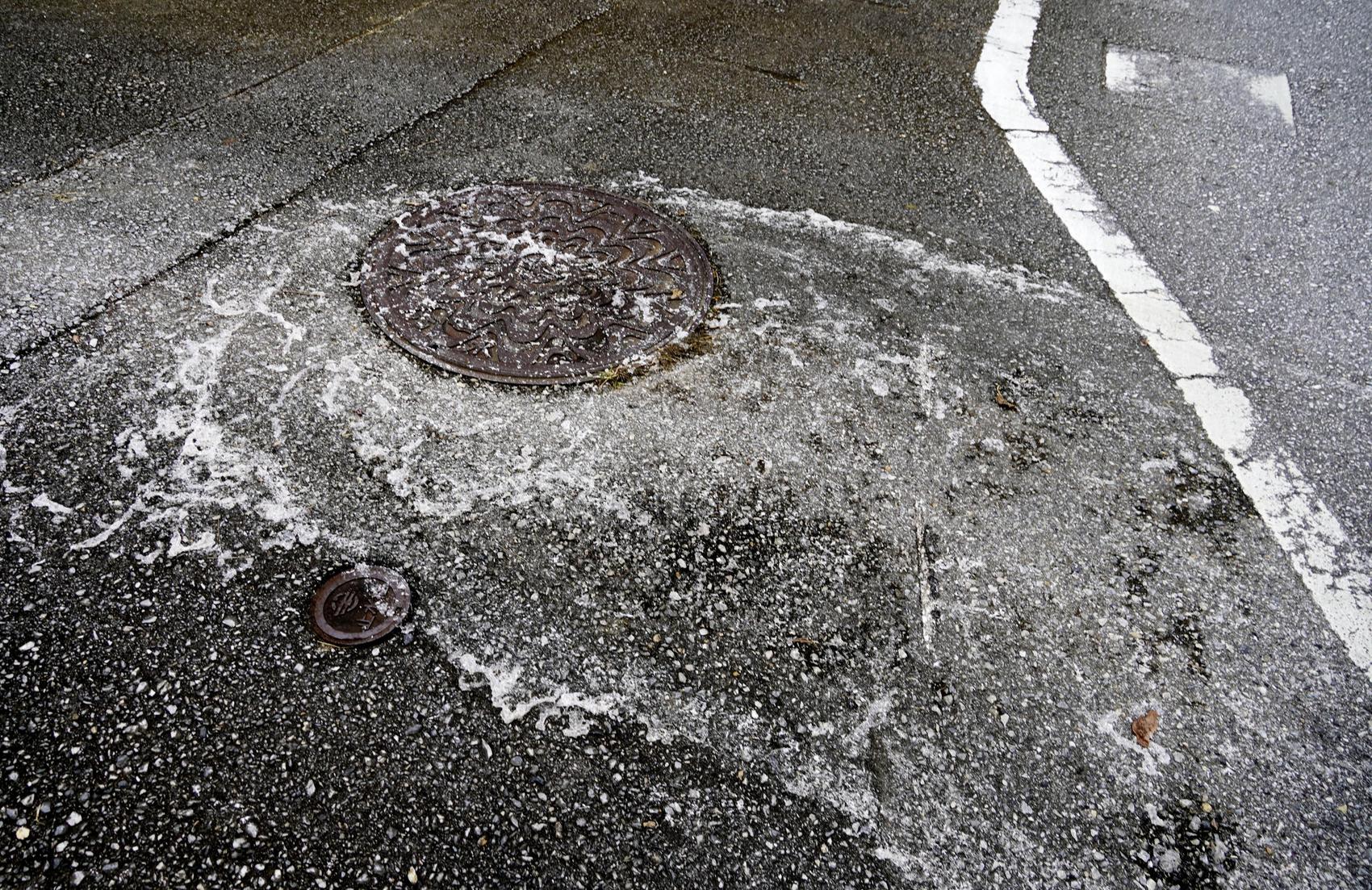 White foam oozes from manhole near U.S. air base in Okinawa